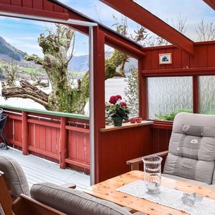 Beautiful cottage with large sunny terrace with barbecue directly on the water.