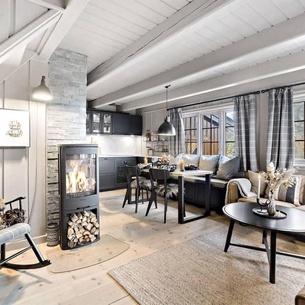 Beautiful cottage with wooden decorations and a modern and comfortable interior.