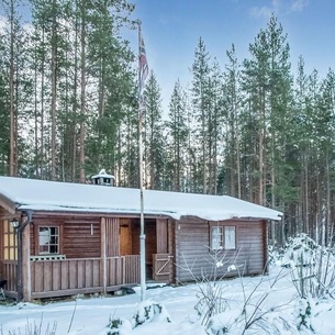 Cozy wooden cottage near the river Glomma.