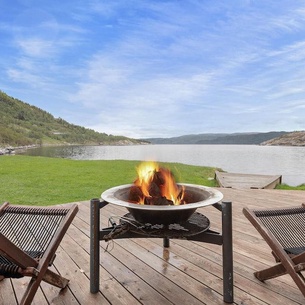 Enjoy a fantastic view of the fjord from this comfortable holiday home.