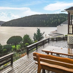 Enjoy the beautiful panoramic view of the fjord from this vacation home.