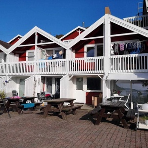 Fantastic fishing hut with sea view directly on the water