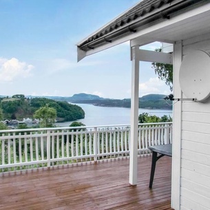 In the middle of Ryfylket in Hjelmeland, not far from the water, lies this beautiful house.