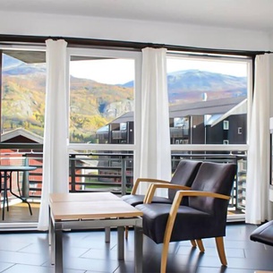 Modern vacation apartment with a view of the ski center and the beautiful surrounding mountains.