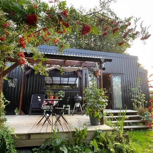 Stunning tiny house in beautiful garden