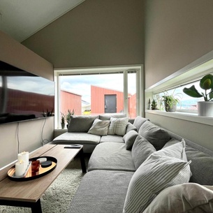 Terraced house with carport and sunny outdoor areas