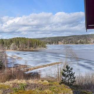 Enjoy a great panoramic view of the water in this vacation home.